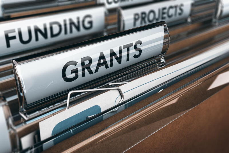 Seeking Grants for an Association, a Small Business or for Research View of brown folders, with focus on grants label, Concept of funding, 3D illustration